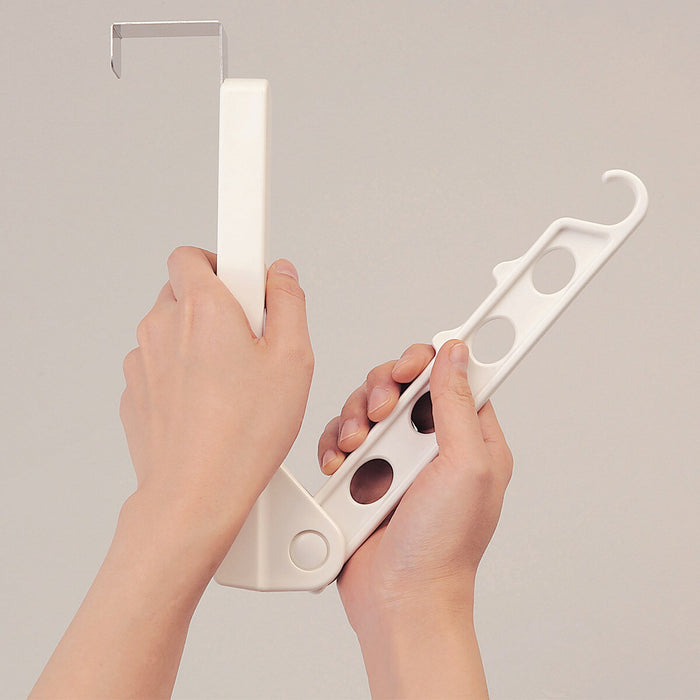 DOOR HANGING ROOM HANGER WITH FOLDABLE ARM